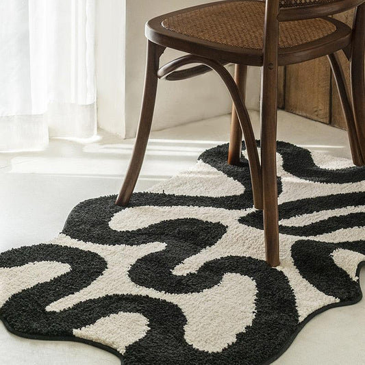 Black Swirl Tufted Area Rug